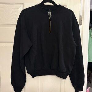 SKIMS Women's cotton fleece classic crew sweatshirt in Onyx (Black)